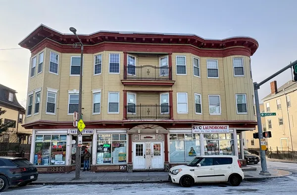 a car parked in front of a building