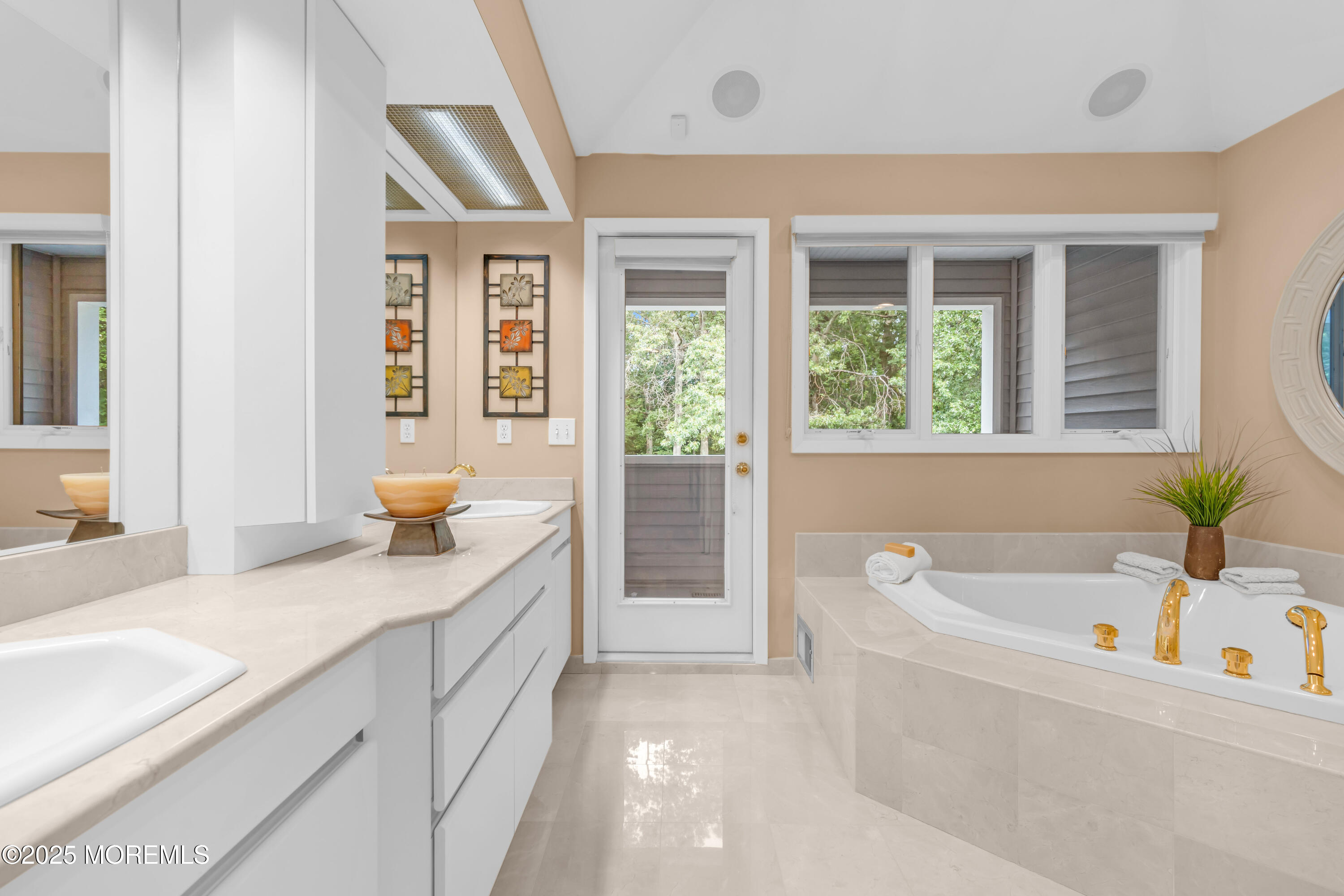 102 Greenwood Road Morganville, NJ 07751 - Photo 5 of 11 a bathroom with a tub sink and view