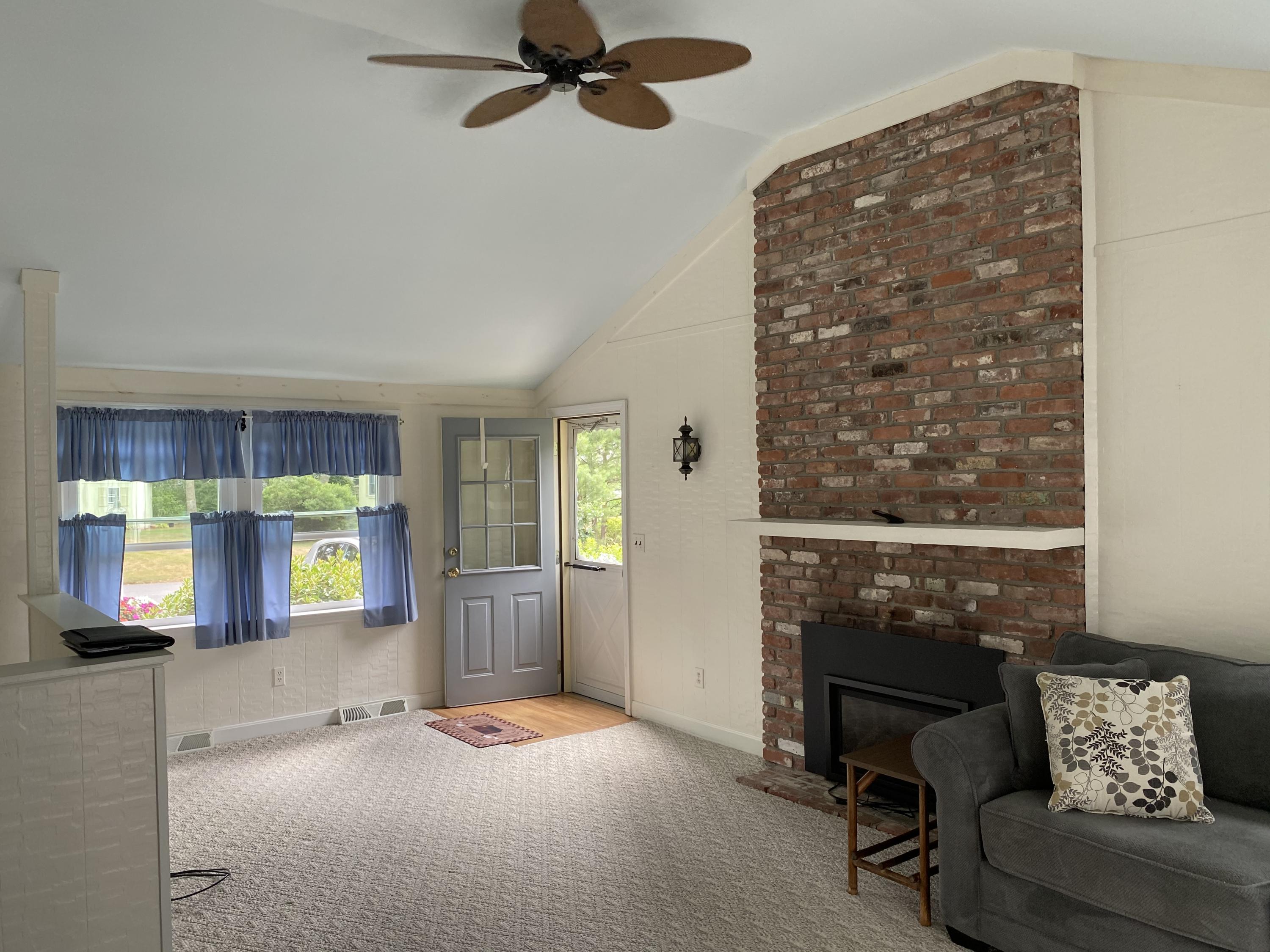 128 Cedric Road Centerville, MA 02632 - Photo 6 of 19 a view of a livingroom with furniture and windows