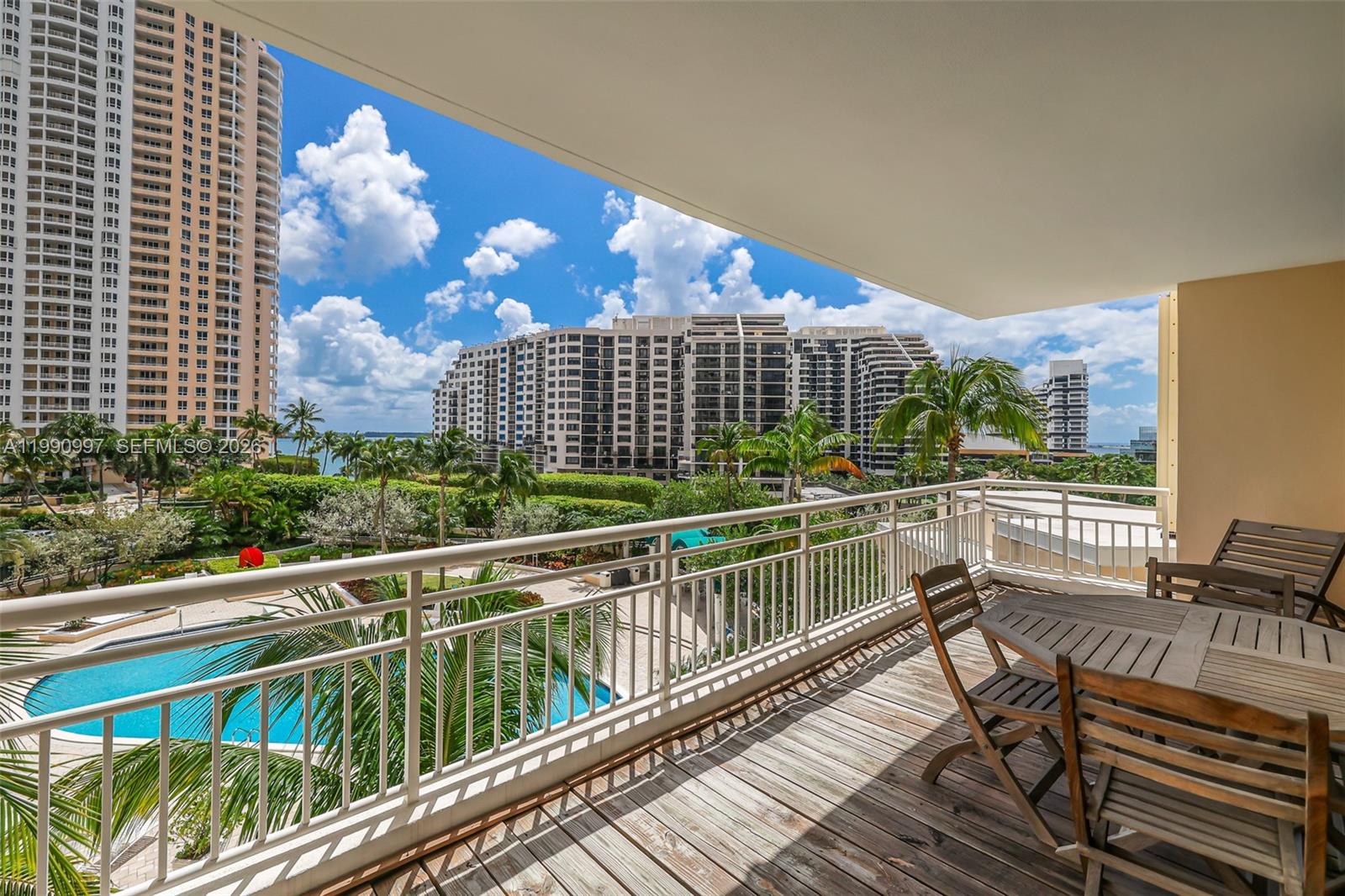 888 Brickell Key Drive, Unit 807 Miami, FL 33131 - Photo 44 of 62 a view of a balcony with wooden floor