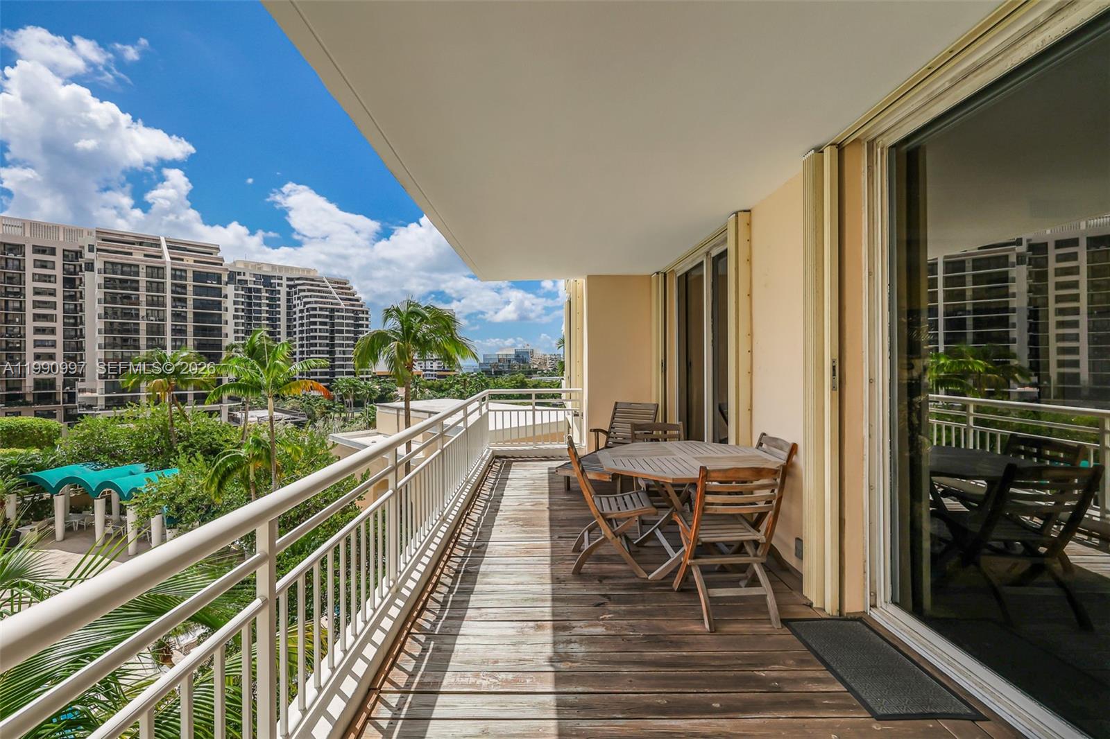 888 Brickell Key Drive, Unit 807 Miami, FL 33131 - Photo 45 of 62 a view of a balcony with chairs