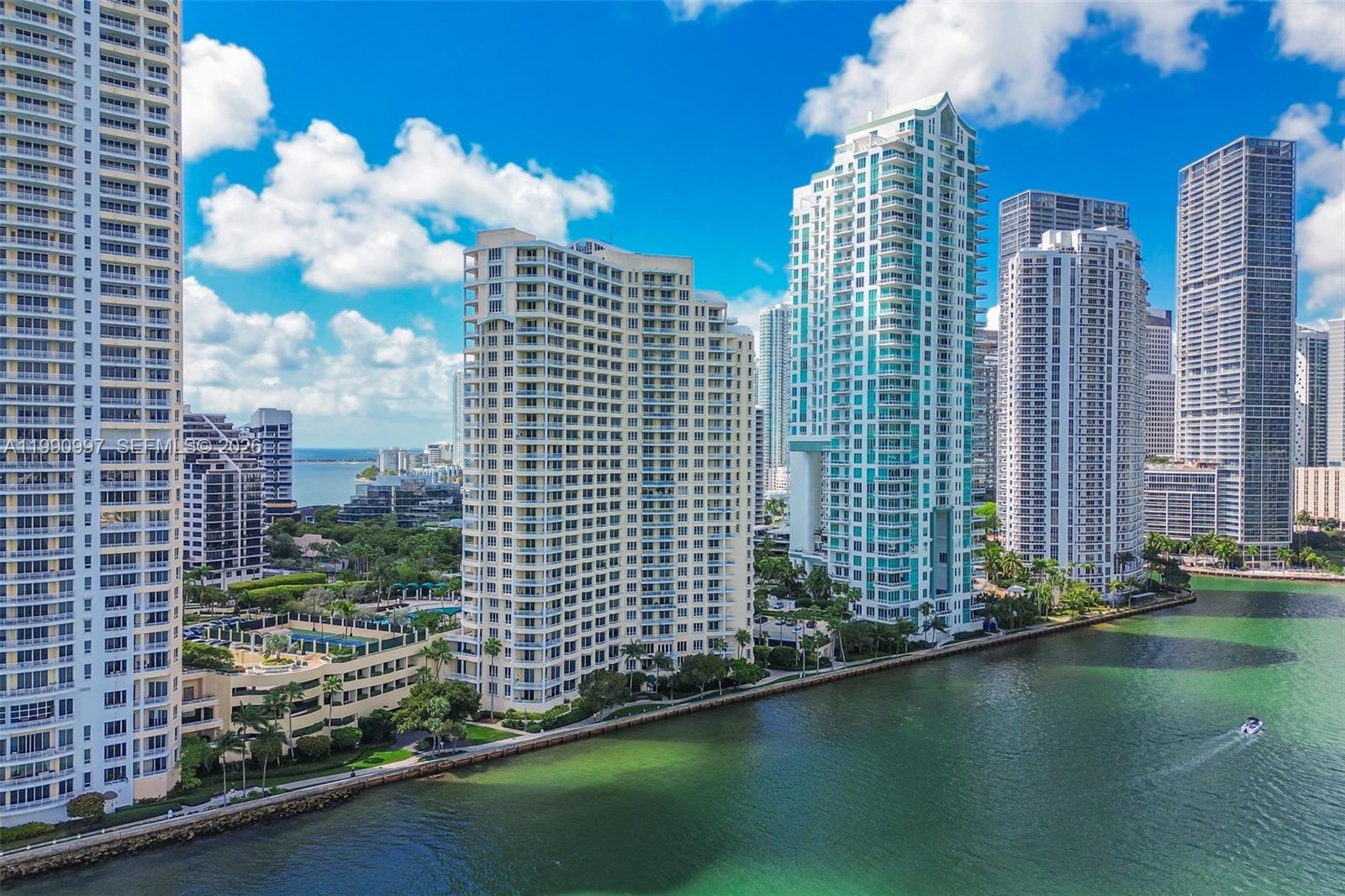 888 Brickell Key Drive, Unit 807 Miami, FL 33131 - Photo 54 of 62 a view of a city with tall buildings