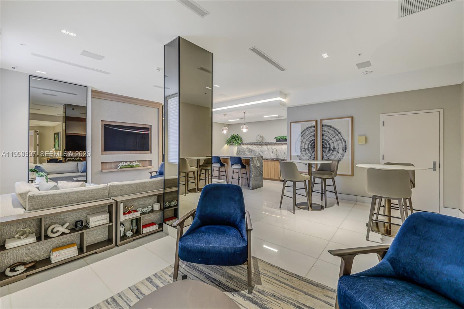 888 Brickell Key Drive, Unit 807 Miami, FL 33131 - Photo 6 of 62 a living room with furniture and a large window