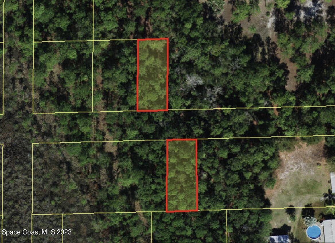 0 13th Street St. Cloud, FL 34771 - Photo 1 of 1 a view of a fence and a potted plant