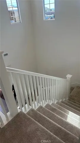 a view of a door and a window