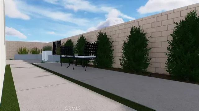 a swimming pool with outdoor seating and plants