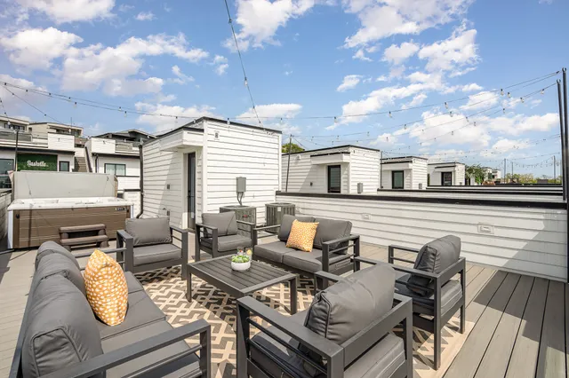 a view of a terrace with furniture