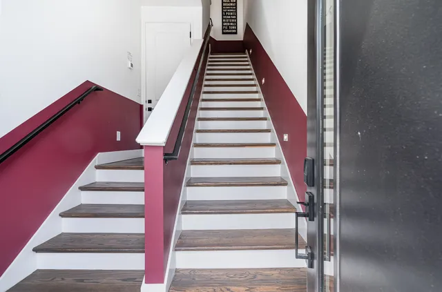 a living room with fireplace furniture and a flat screen tv