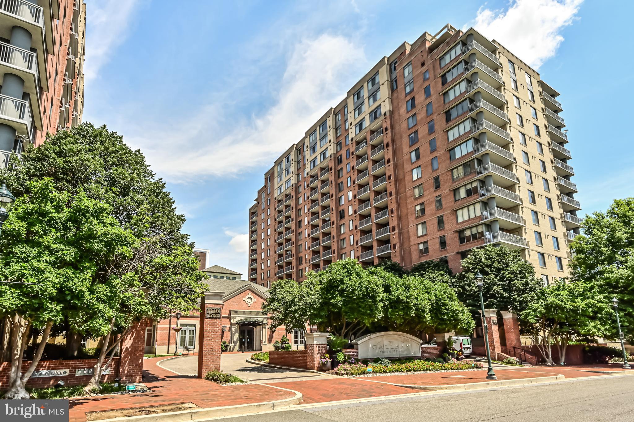 11710 Old Georgetown Road, Unit 1212 Rockville, MD 20852 - Photo 2 of 55 a view of a tall building next to a road