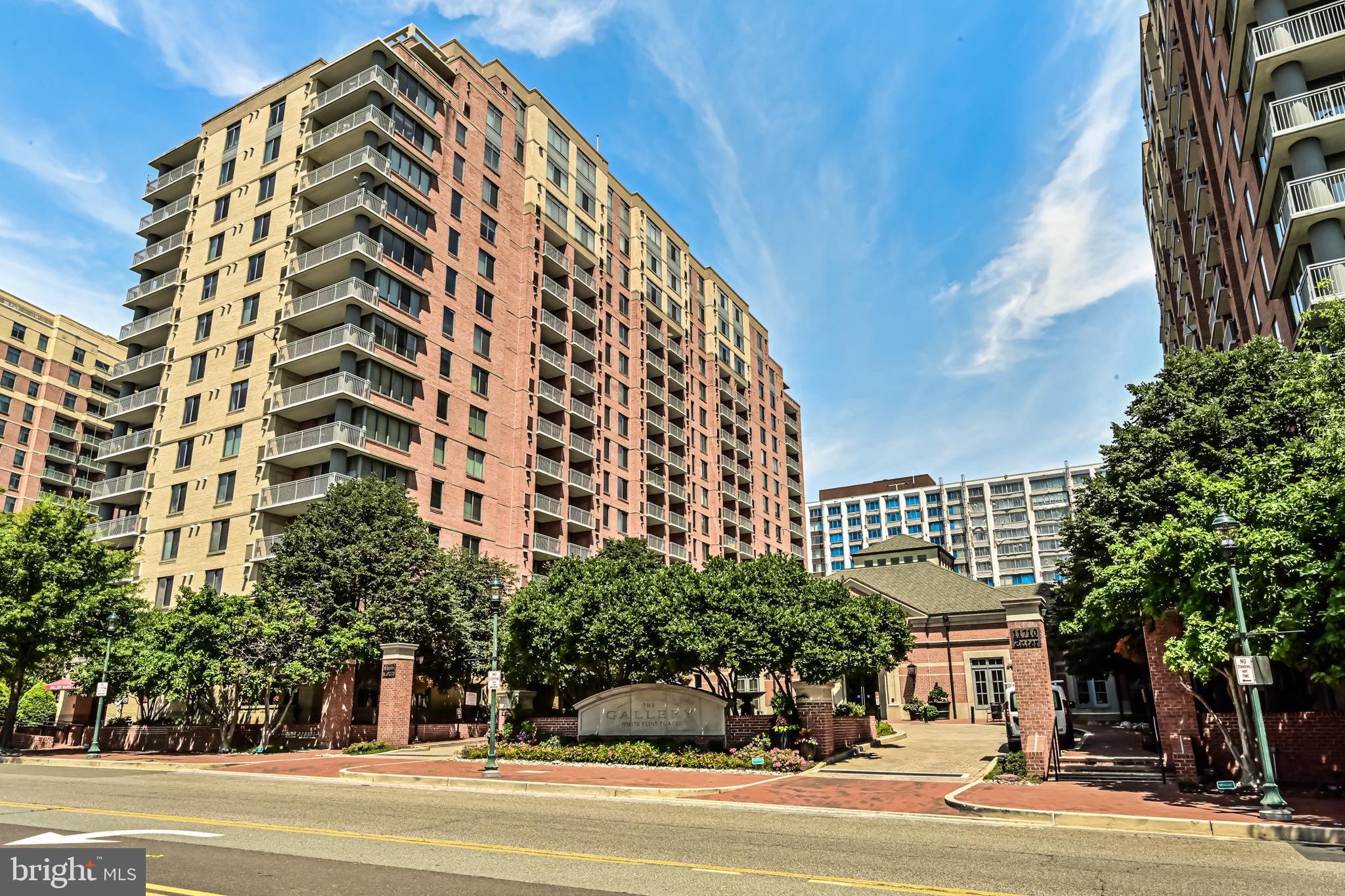 11710 Old Georgetown Road, Unit 1212 Rockville, MD 20852 - Photo 3 of 55 a view of a tall building next to a road