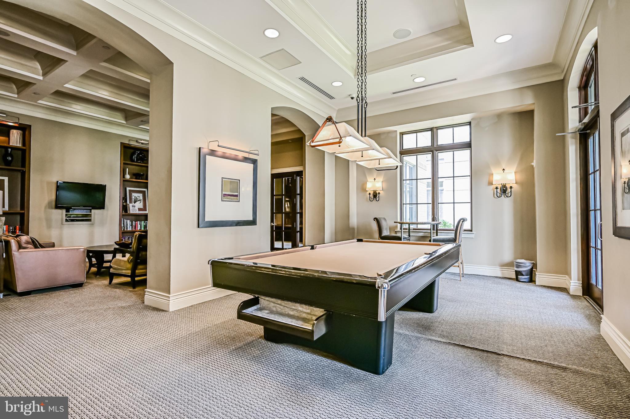 11710 Old Georgetown Road, Unit 1212 Rockville, MD 20852 - Photo 45 of 55 a room with pool table and flat screen tv