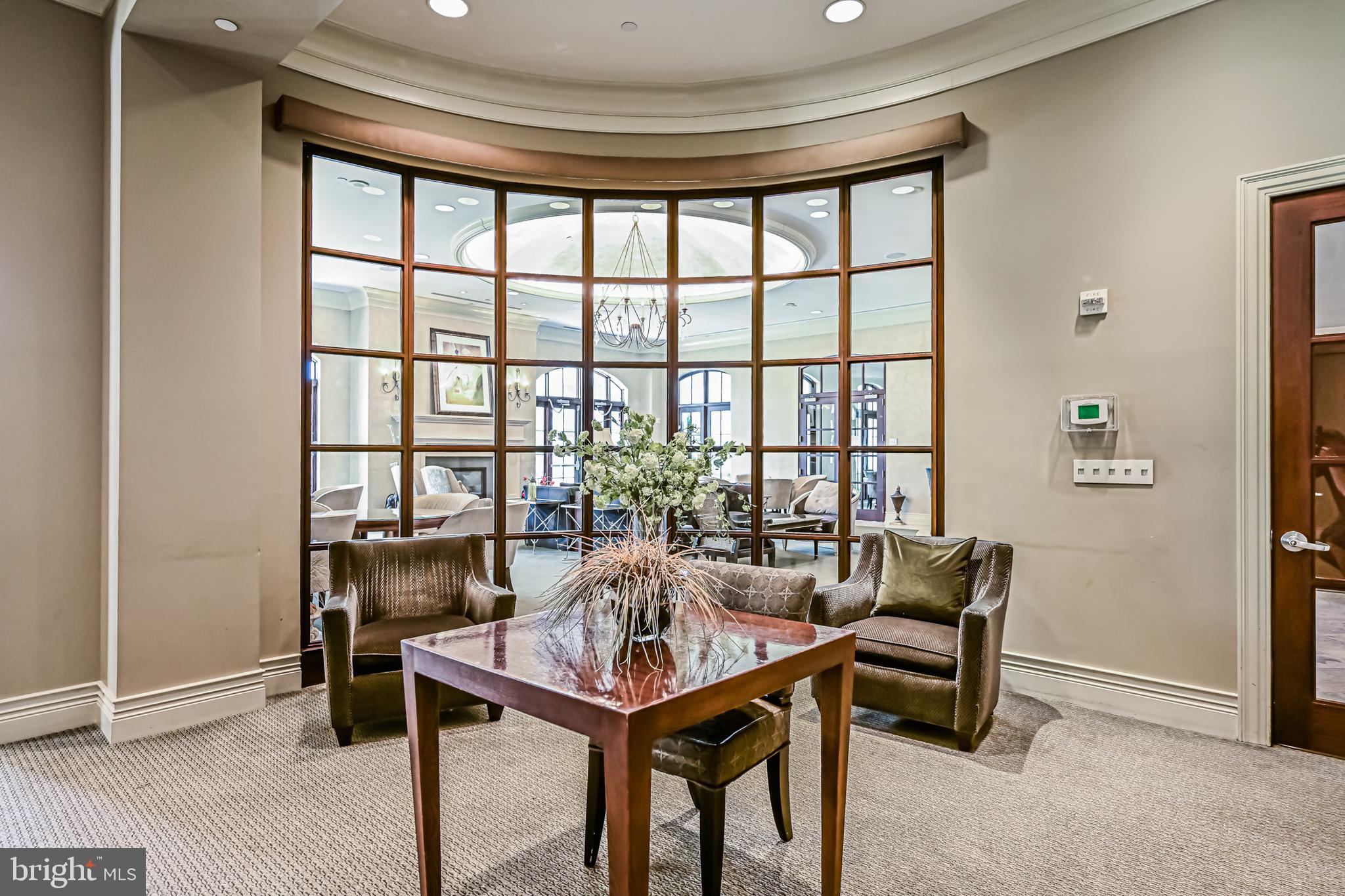 11710 Old Georgetown Road, Unit 1212 Rockville, MD 20852 - Photo 49 of 55 a dining room with furniture and window