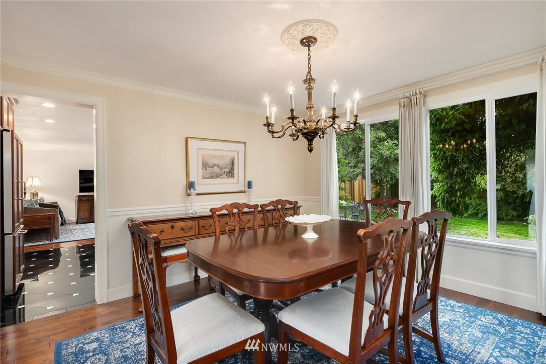 840 Bell Street Edmonds, WA 98020 - Photo 14 of 40 a view of a dining room with furniture window and wooden floor