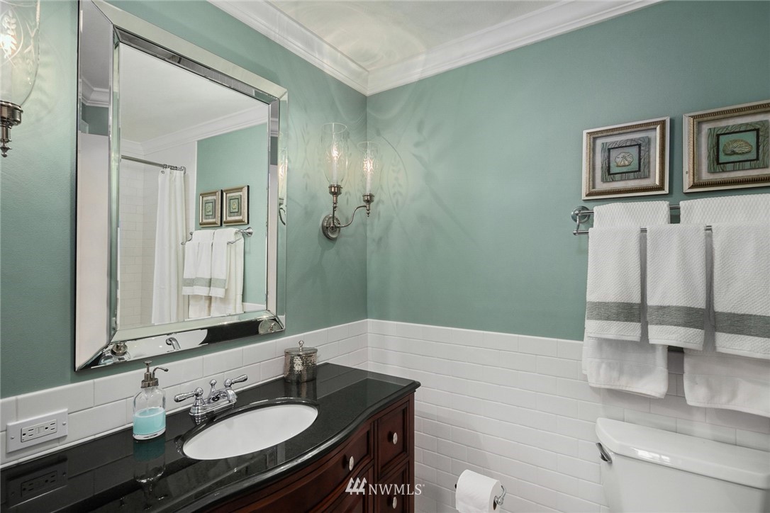 840 Bell Street Edmonds, WA 98020 - Photo 26 of 40 a bathroom with a sink and a mirror