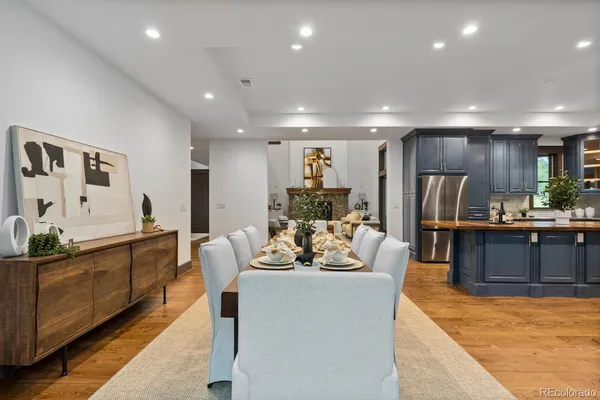 a living room with furniture and large window