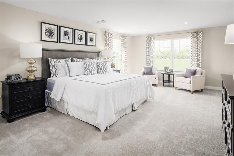 105 Ripplemead Court Gallatin, TN 37066 - Photo 11 of 21 a bedroom with a bed and a couch