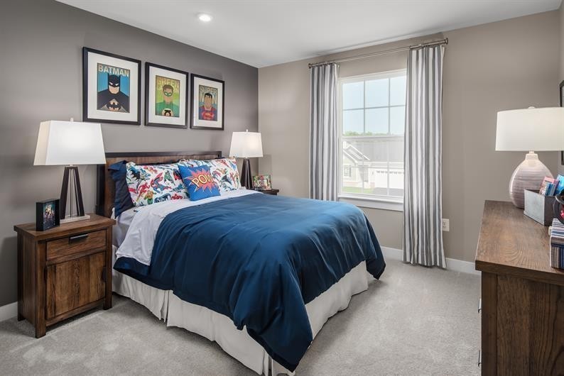 105 Ripplemead Court Gallatin, TN 37066 - Photo 15 of 21 a spacious bedroom with a bed and a lamp