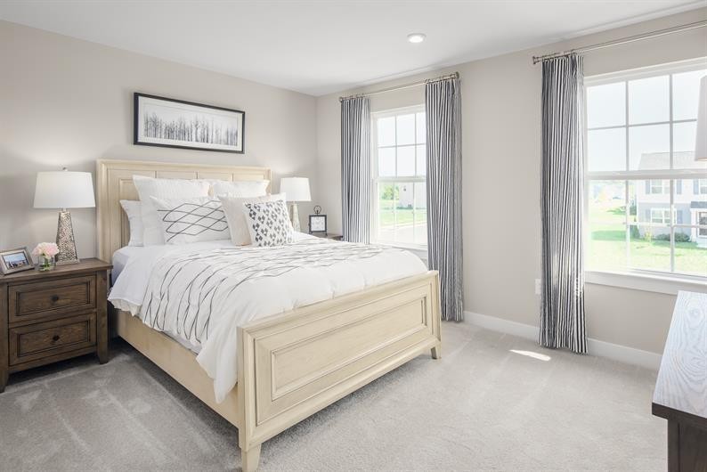 105 Ripplemead Court Gallatin, TN 37066 - Photo 16 of 21 a spacious bedroom with a bed and a window