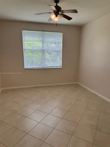 en empty room with windows