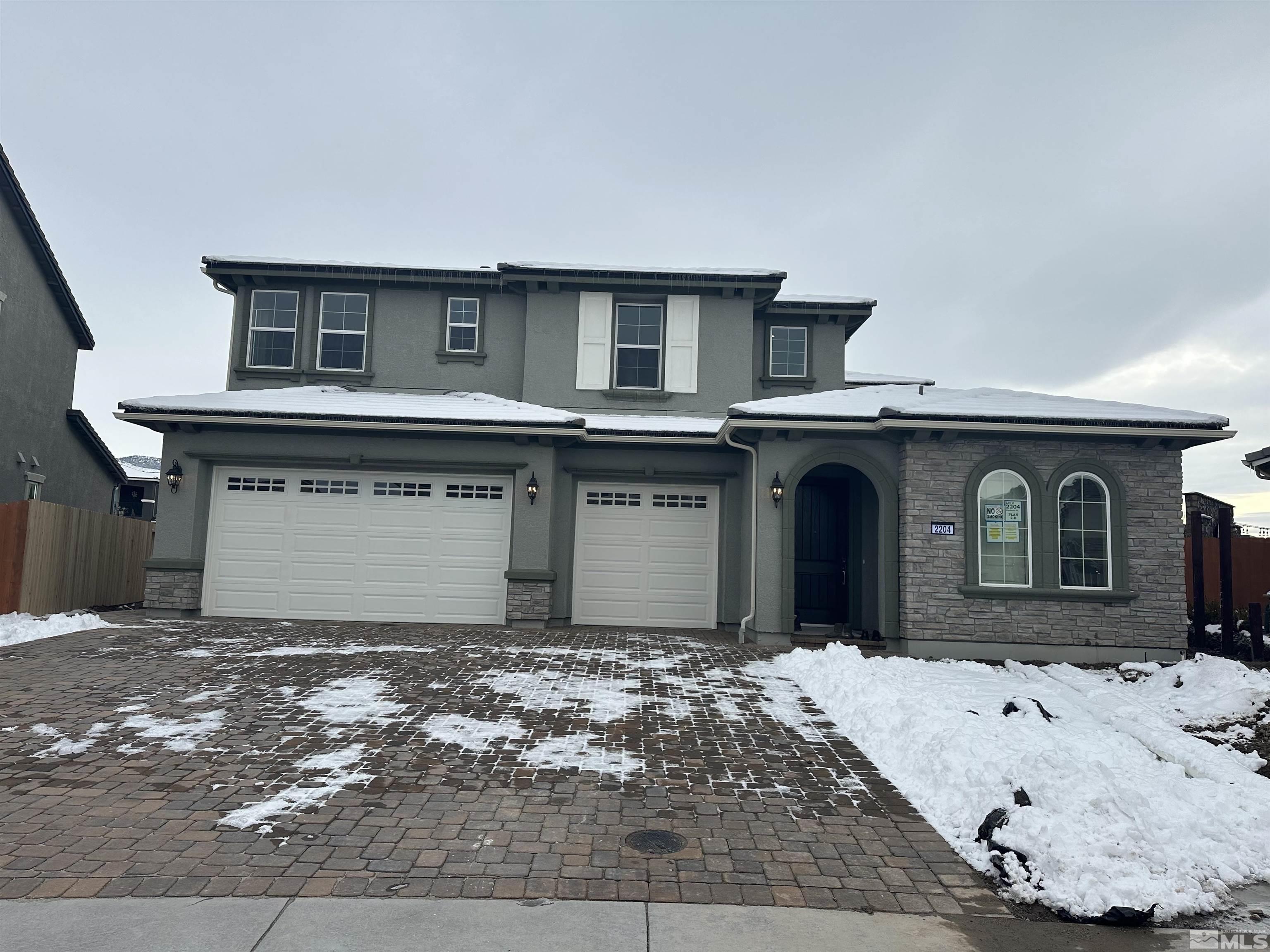 2204 Edgelands Drive Reno, NV 89521 - Photo 1 of 1 a front view of a house with a yard