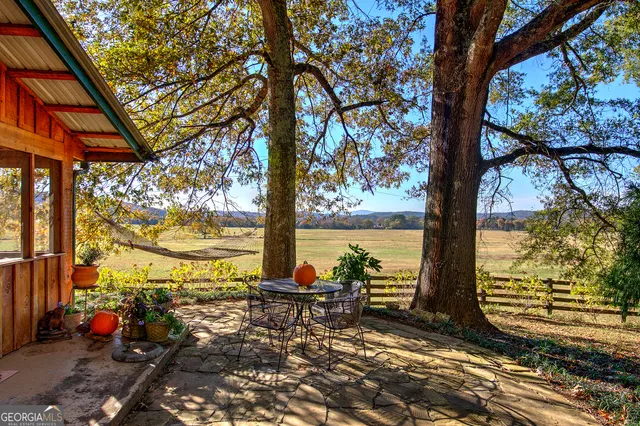 a view of ocean and a mountain