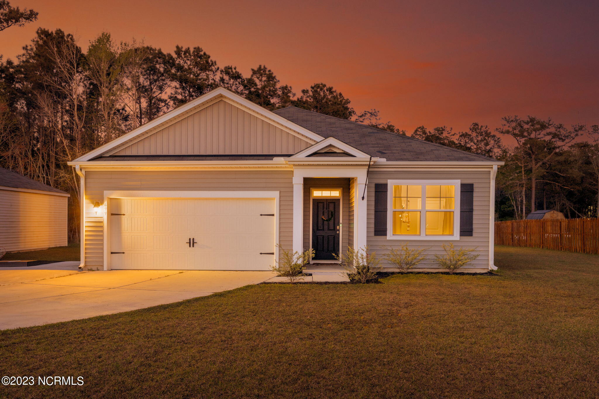 699 Morris Landing Road Holly Ridge, NC 28445 - Photo 1 of 38 1-web-or-mls-twilight-exterior-01