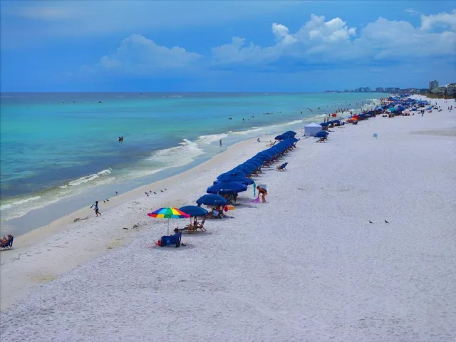 an aerial view of a ocean beach