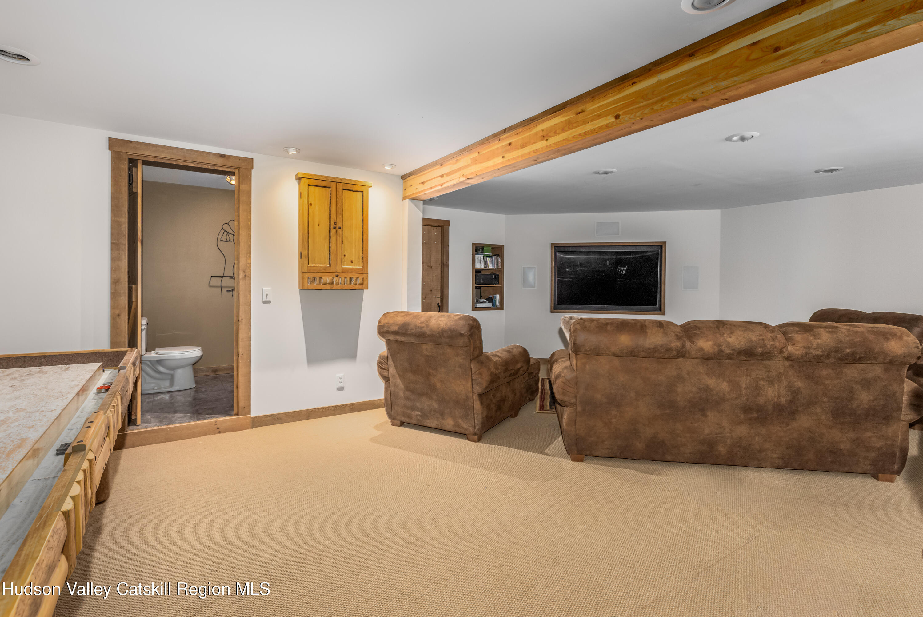 688 Bruce Porn Road Gilboa, NY 12167 - Photo 90 of 104 a living room with a couch and a dining table