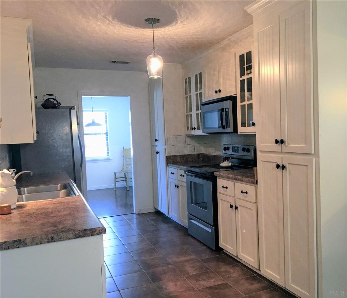 4125 April Road Pensacola, FL 32504 - Photo 7 of 47 Yes, two pantries in this great kitchen