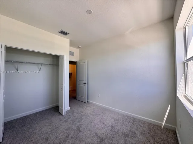 an empty room with window