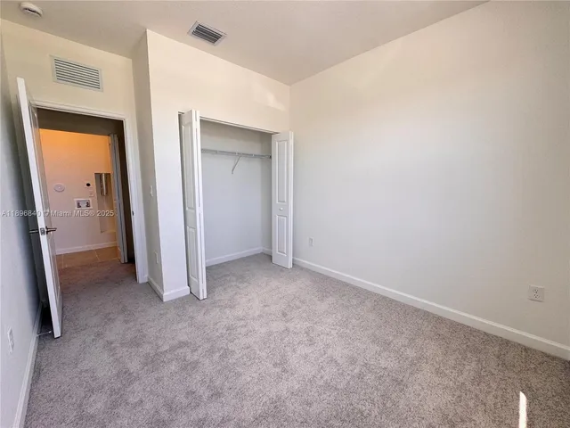 an empty room with closet