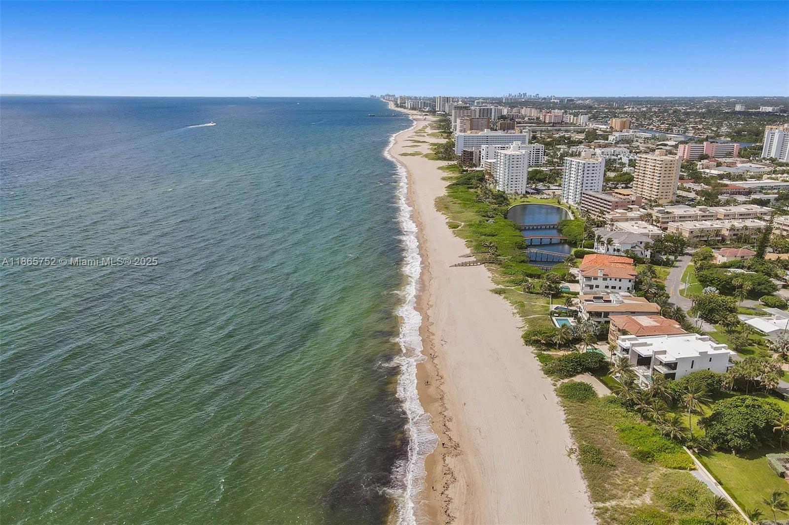 3421 Dover Road Pompano Beach, FL 33062 - Photo 38 of 83 a view of a lake with a city
