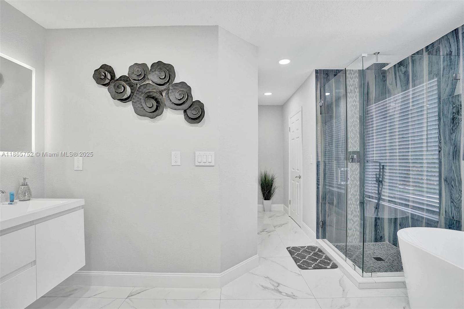 3421 Dover Road Pompano Beach, FL 33062 - Photo 59 of 83 a bathroom with a sink toilet and shower