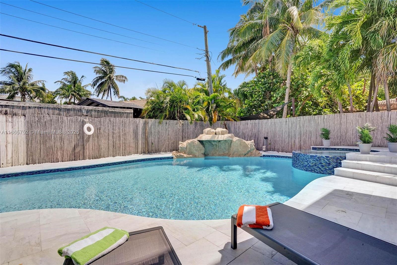 3421 Dover Road Pompano Beach, FL 33062 - Photo 79 of 83 a view of a backyard with a garden and plants