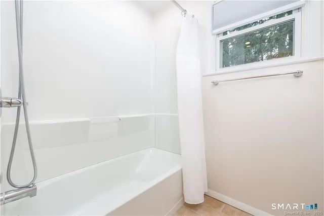 a bathroom with a bathtub