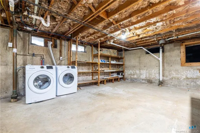 a utility room with dryer and washer