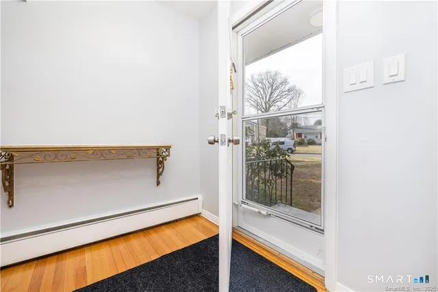 a view of a room with a large window