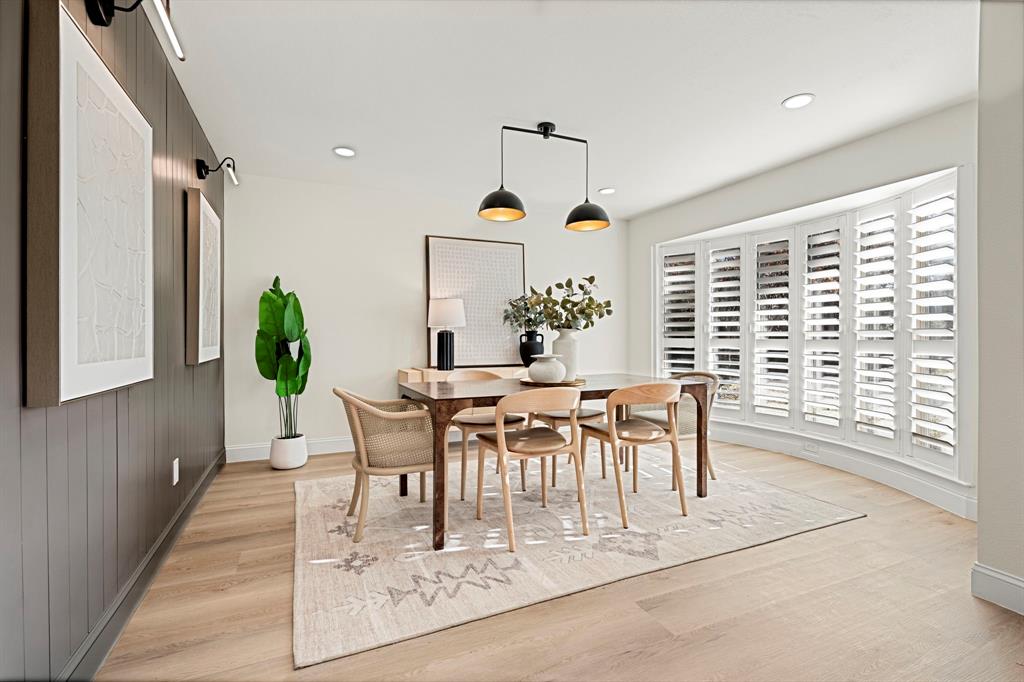 9376 Briarhurst Drive Dallas, TX 75243 - Photo 17 of 38 a dining room with furniture and a large window