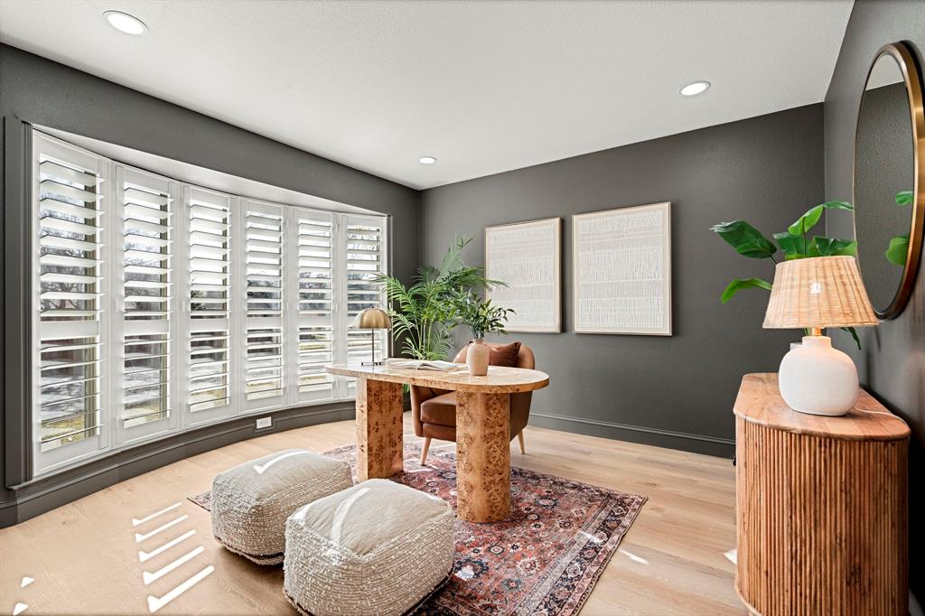 9376 Briarhurst Drive Dallas, TX 75243 - Photo 19 of 38 a living room with furniture and a window