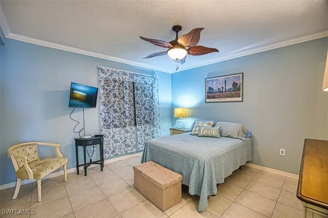 a bathroom with a sink toilet a mirror and shower curtain