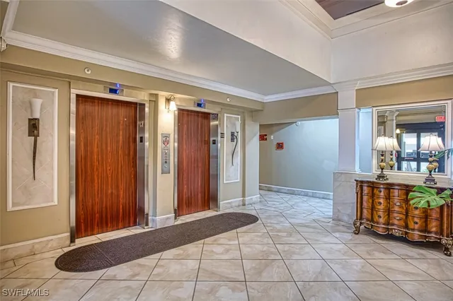 a view of a hallway with windows