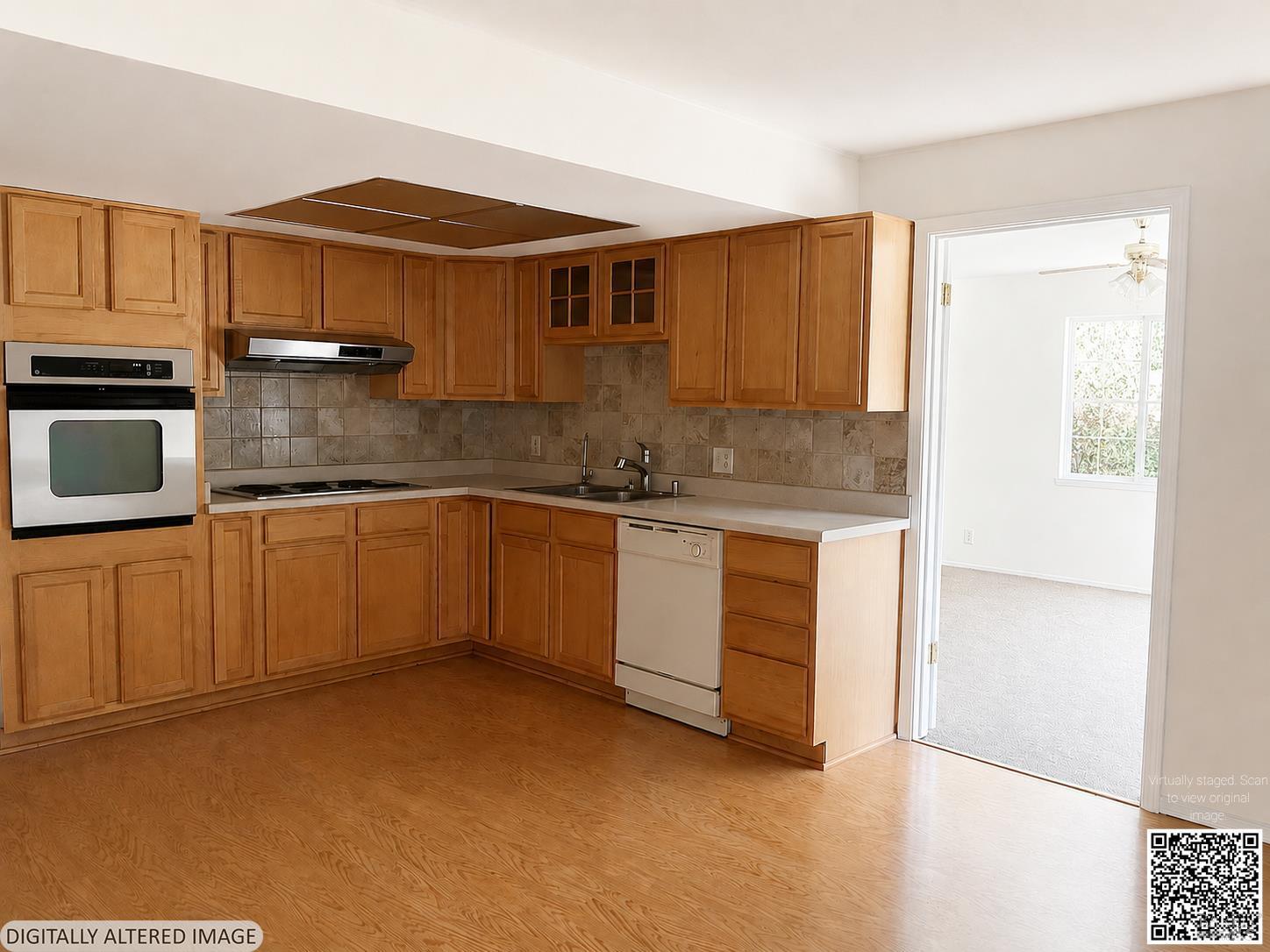 415 Mono Drive Vacaville, CA 95687 - Photo 3 of 10 a kitchen with granite countertop a sink and cabinets