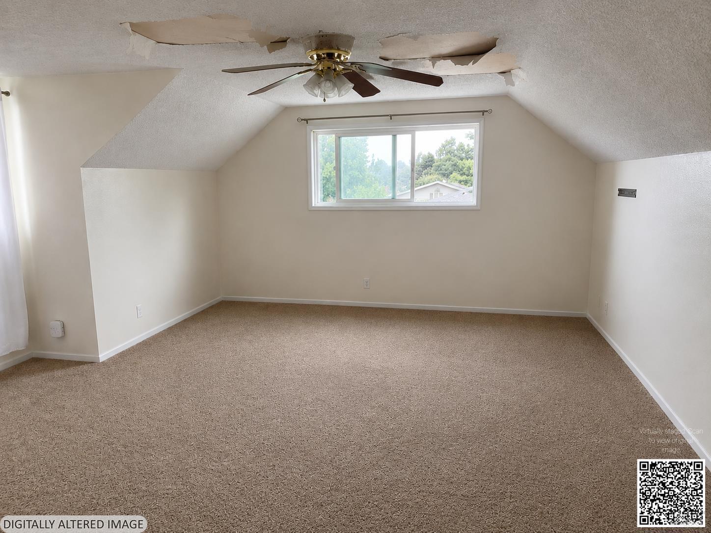415 Mono Drive Vacaville, CA 95687 - Photo 8 of 10 an empty room with windows and fan