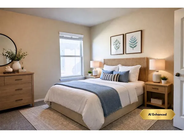 a bedroom with a bed and a dresser