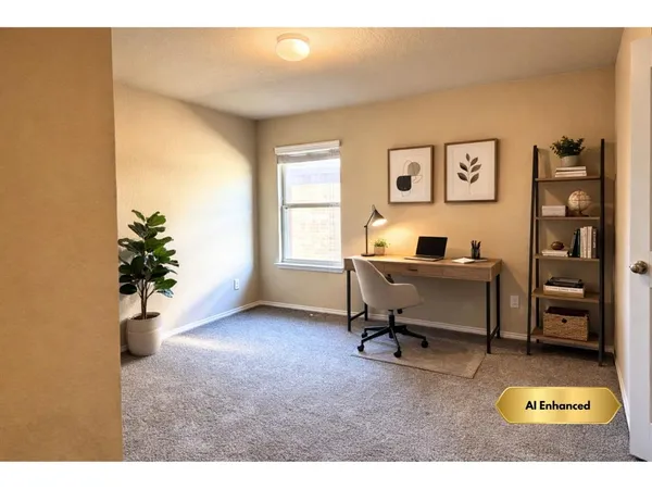 a workspace with furniture and a window