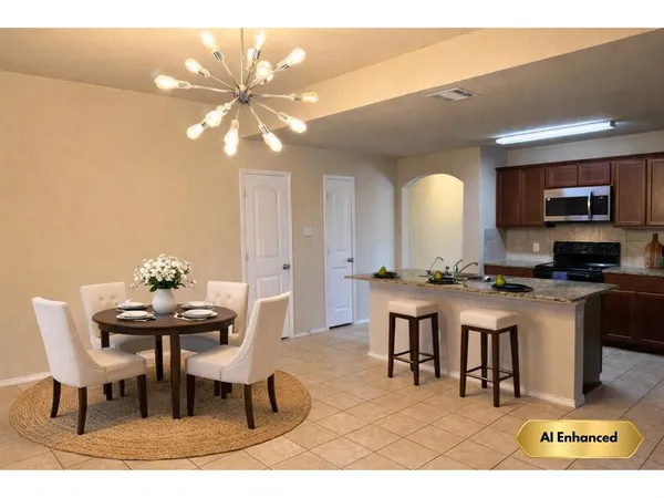 a view of a dining room with furniture