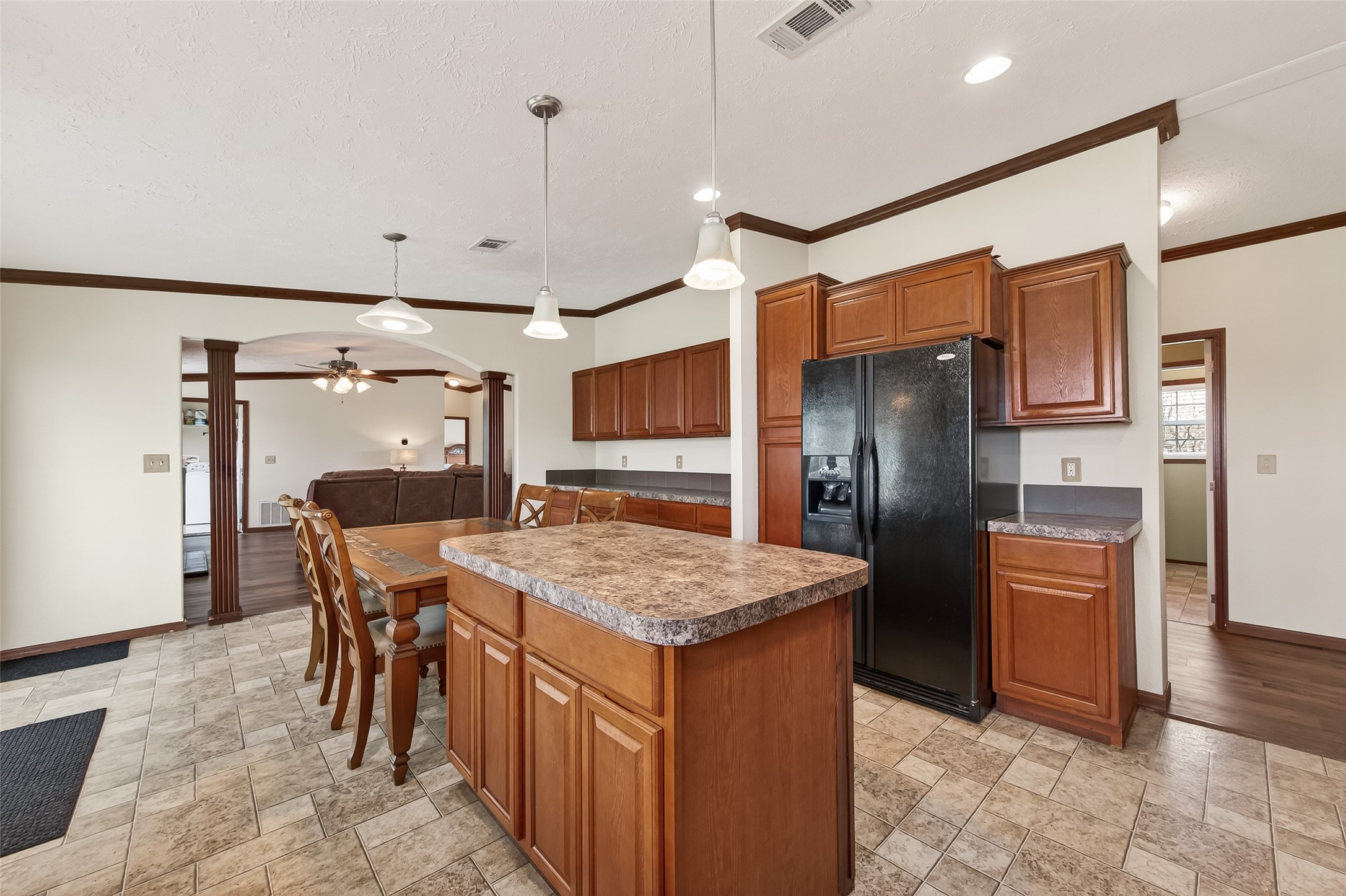 9820 Oberrender Road Needville, TX 77461 - Photo 15 of 30 a kitchen with stainless steel appliances granite countertop sink refrigerator and microwave