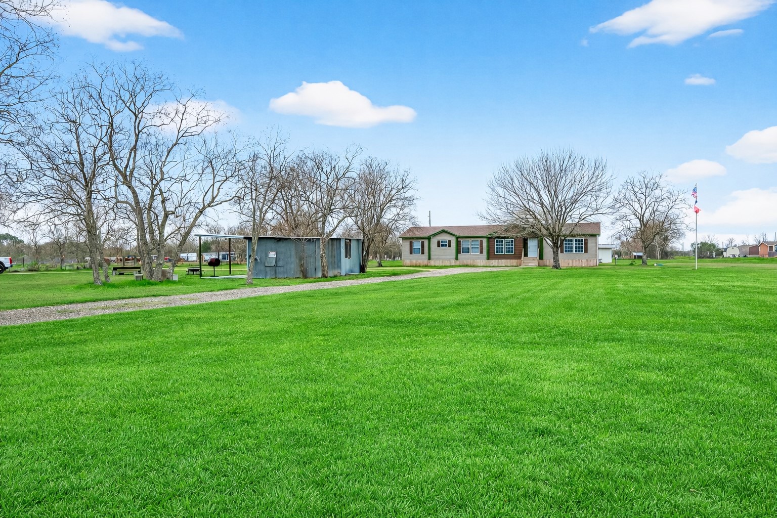 9820 Oberrender Road Needville, TX 77461 - Photo 2 of 30 a view of a park with large trees