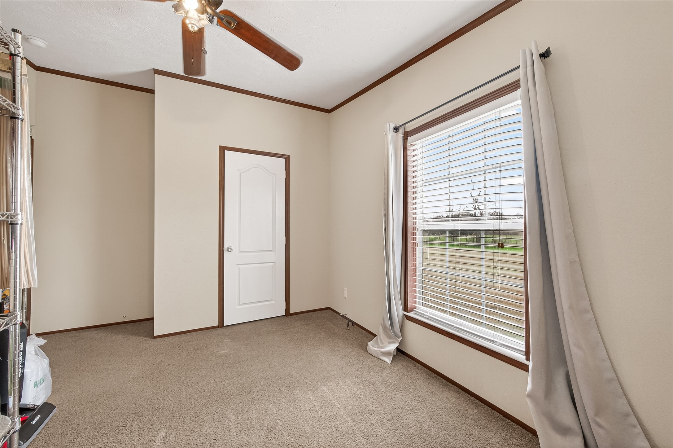 9820 Oberrender Road Needville, TX 77461 - Photo 22 of 30 a view of an empty room with a window