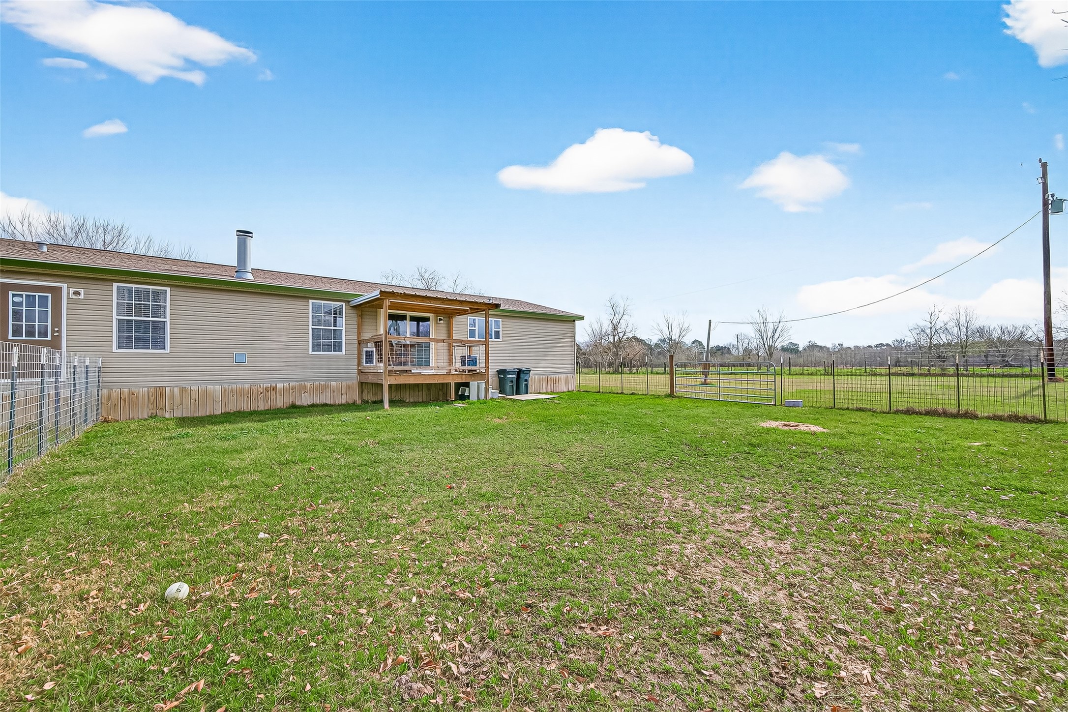 9820 Oberrender Road Needville, TX 77461 - Photo 28 of 30 a view of a house with a backyard